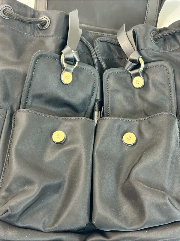 Kate Spade New York Carly Flap Drawstring Backpack in Black Technical Nylon - Image 14