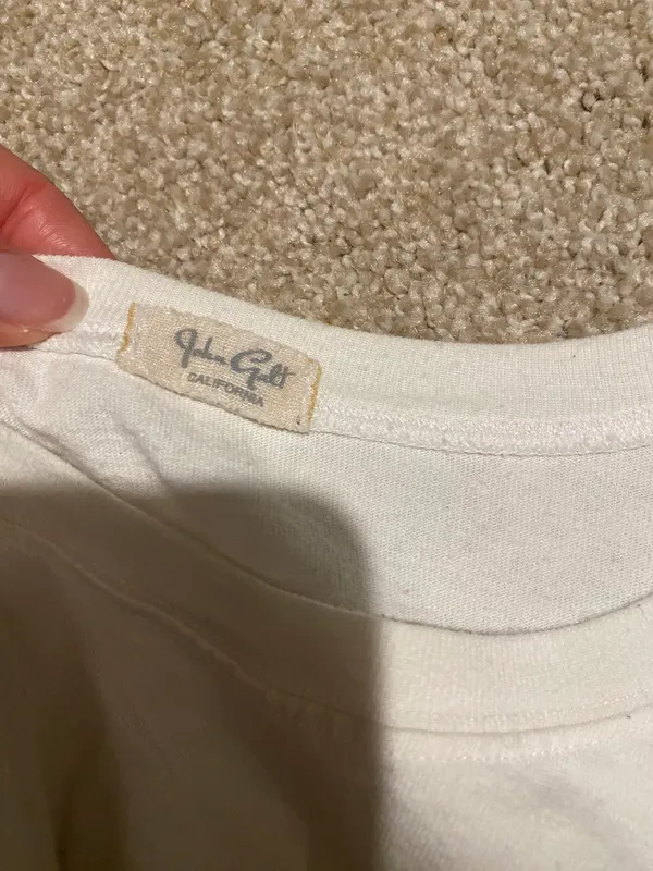 Brandy Melville “London” White Baby Tee - Image 4