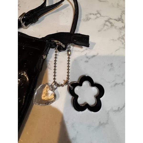 GUESS crossbody black purse silver "G" logo buckle matching flower charm VTG - Image 3