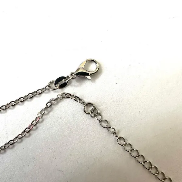 Silver tone and black dainty cross necklace - Image 6