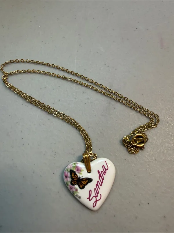 Source Unknown Gold-Tone Chain with White Heart Pendant and Butterfly Detail - Image 4
