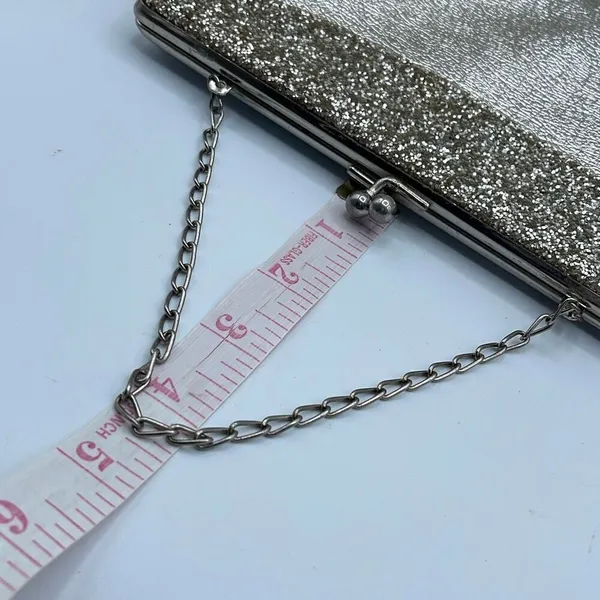Vintage mid century silver foil clutch with silver cut stones . - Image 9