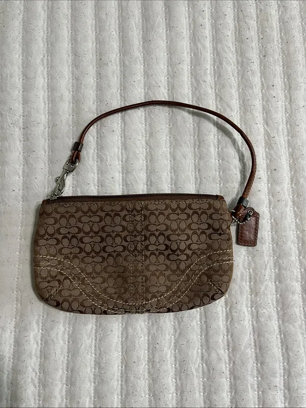 Coach Brown Signature Canvas Wristlet with Tan Leather Trim and Silver Buckle - Image 2