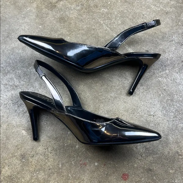 Calvin Klein Metallic Slingback Heels
Size: 9 - Image 2