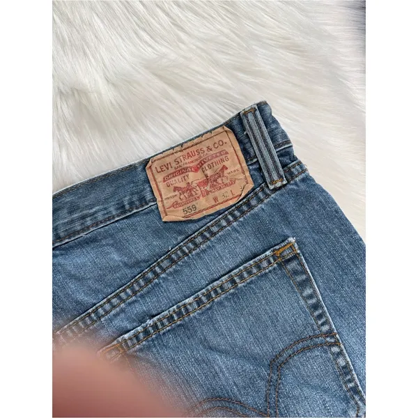 Levi’s 559 Relaxed Cut From Mens Jeans Faded Blue Denim Cut Offs - Image 6