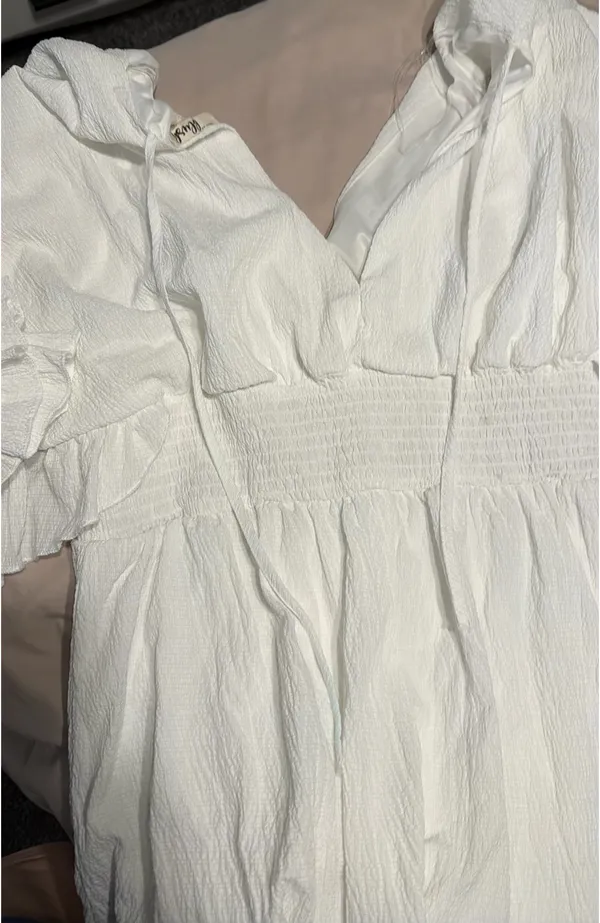 Blush white ruffle dress with flowy sleeves - Image 3