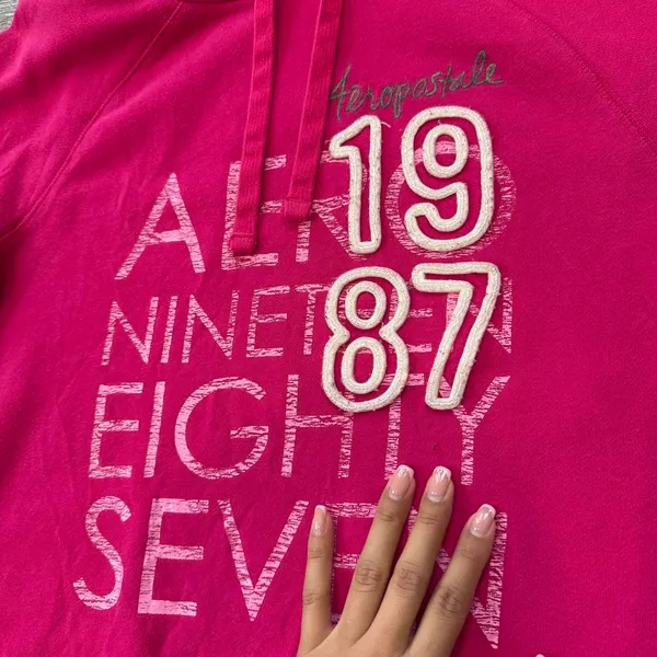 Y2K Pink Aeropostale hoodie with white text reading 'AEROPOSTALE 1987' size M Ptp: 18.5” Inseam: 21.5” Small imperfections as pictured on the front barely noticeable #aeropostale #y2k #hoodie #00s #aero - Image 4