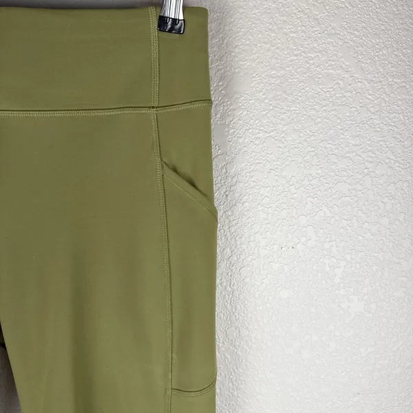 Lululemon Invigorate High-Rise Tight 25"‎ Size 10 Bronze Green Side Pockets - Image 2