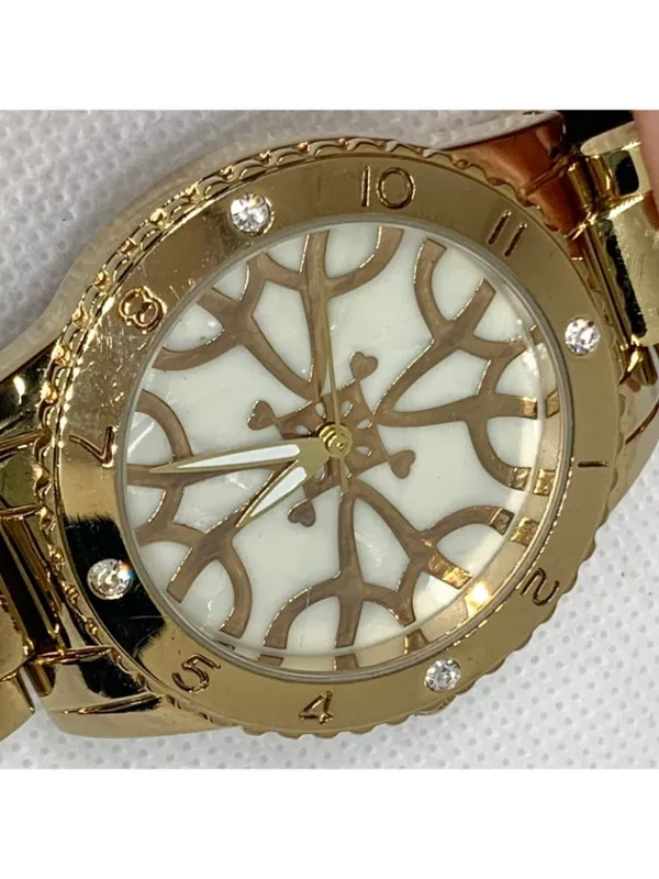 Women’s gold tone watch 38mm round quartz analog mop dial size 7” running - Image 3