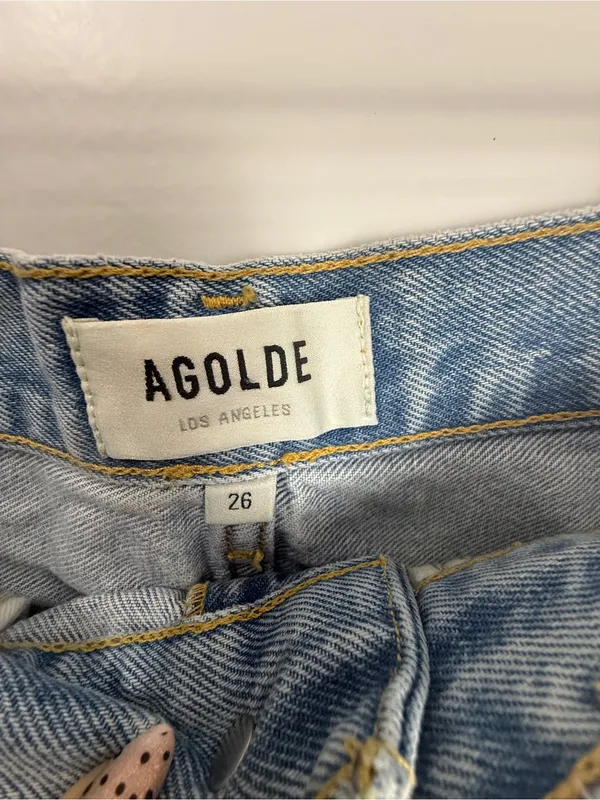 AGOLDE Light Wash Distressed Denim Cutoff Shorts - Image 5