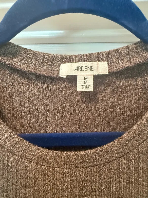 Soft ribbed knit short sleeve top. Crew neckline with fitted silhouette. - Image 3