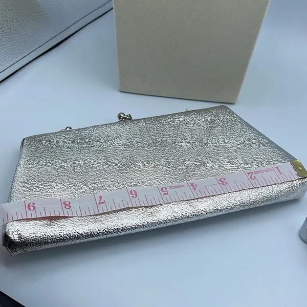 Vintage mid century silver foil clutch with silver cut stones . - Image 8