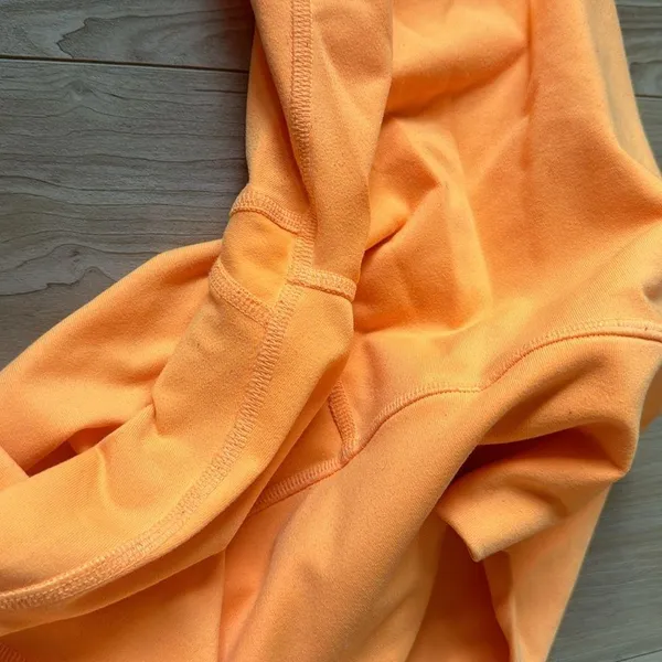 Alo Bright Orange Biker Shorts - Image 5