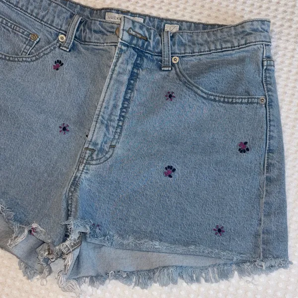 Lucky Brand 12/31 Pins Blue Denim Cut Off Jean Shorts Embroidered Purple Flower - Image 2