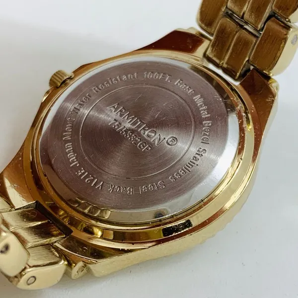 Armitron 27mm ladies Quartz analog WR watch gold tone MOP dial 6.5”-7” - Image 6