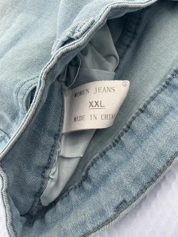 Washed Light Blue Denim Shorts with Lace Trim - Image 2