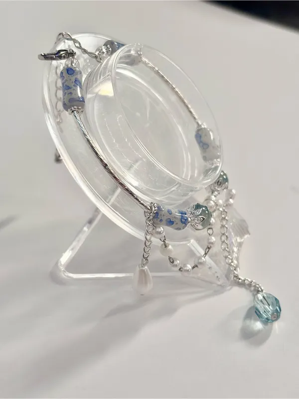 Handmade Hand Crafted Silver Bracelet with Blue and White Beads and Mermaid Tail Charm - Image 5