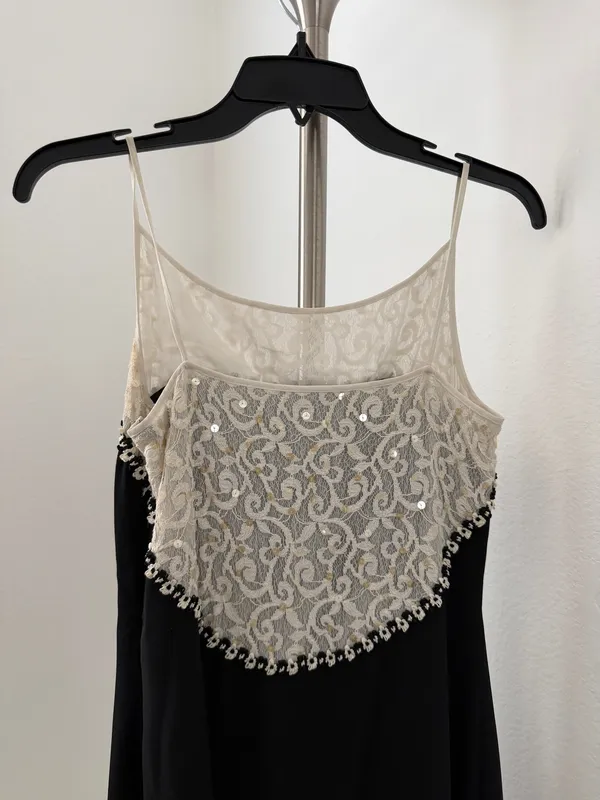 Elegant black maxi dress featuring a delicate cream lace yoke and thin straps. - Image 3