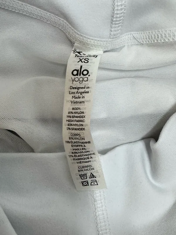 Alo High-Waist White Bike Shorts with Overlay - Image 6