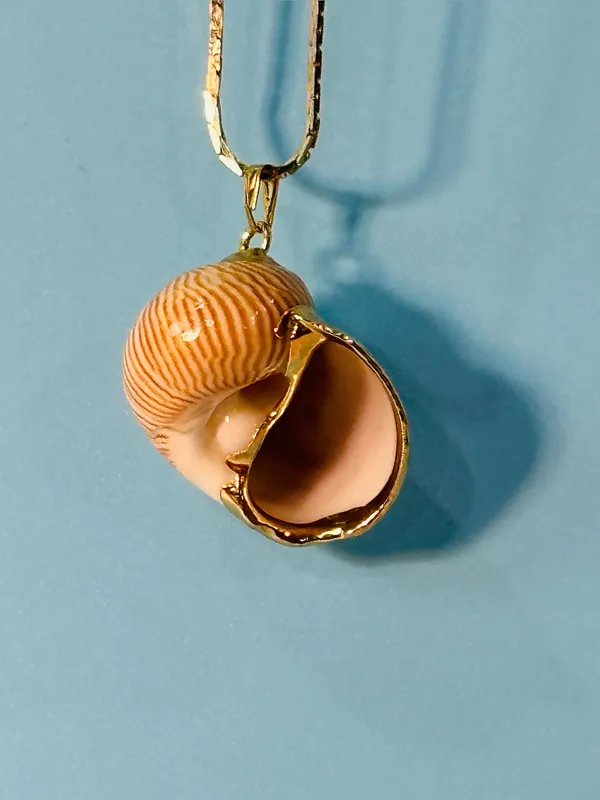 Gold Layered Necklace with Beige Swirl Pendant - Image 3