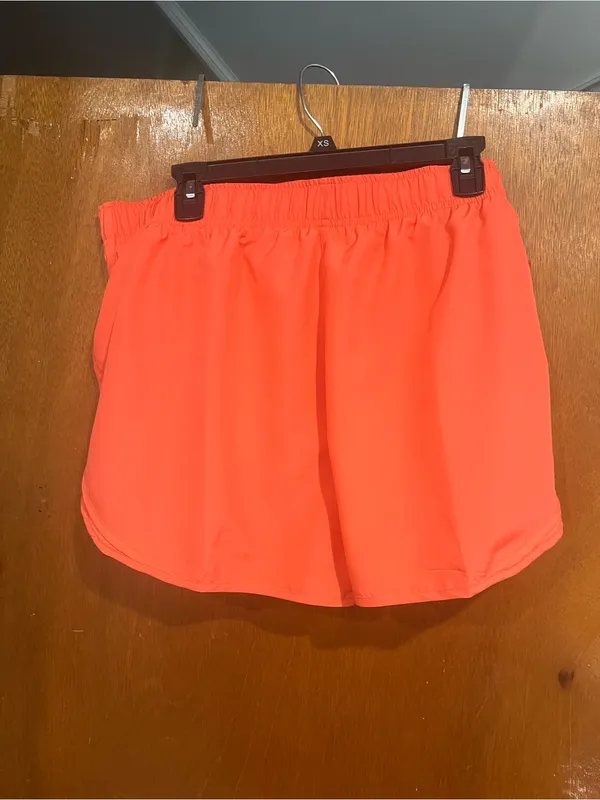 Nike Women's Coral Athletic Shorts with White Swoosh - Image 4