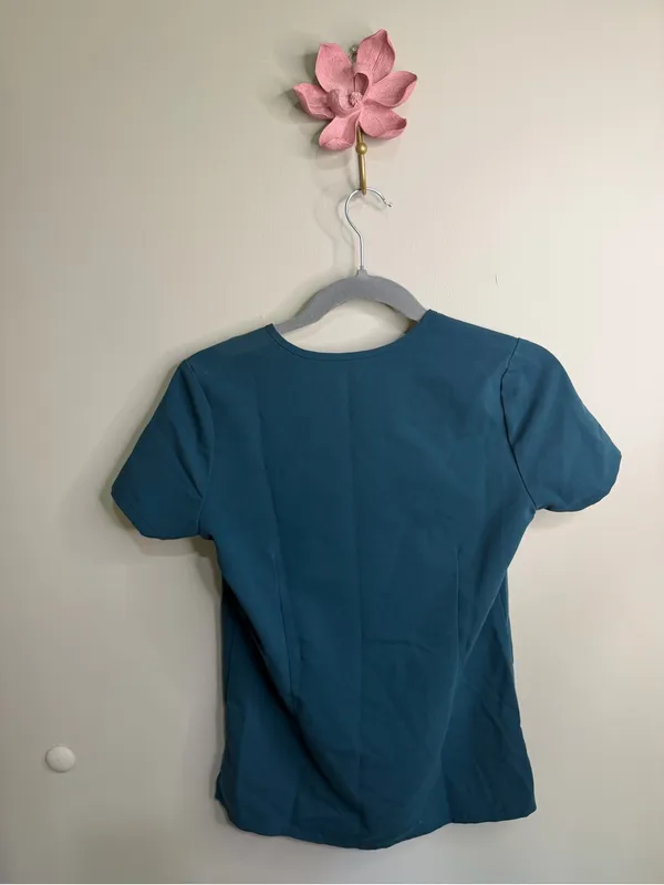Figs Women’s Teal V-Neck Scrub Top with Navy Pants - Image 7