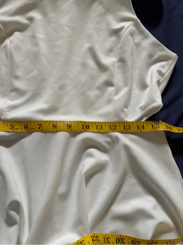 Sleeveless White Mini Dress with Side Cutouts - Image 12