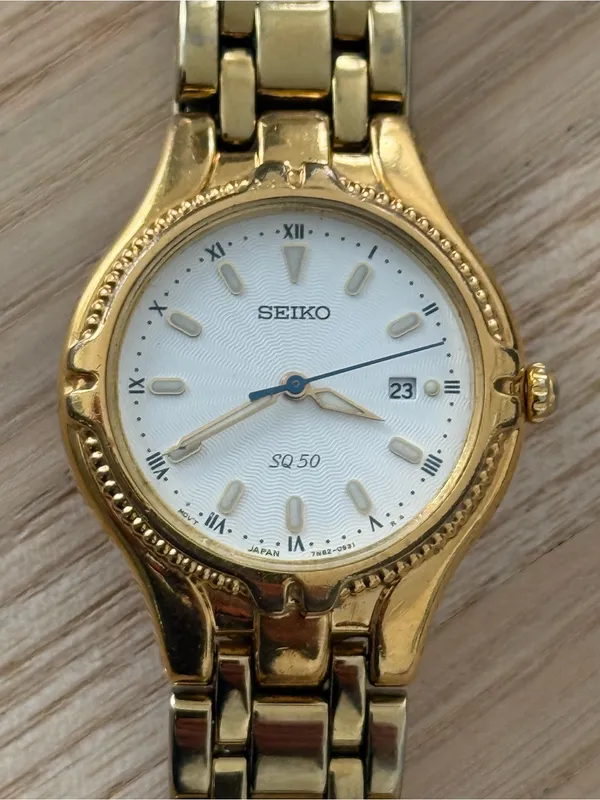 Seiko Vintage Watch Gold Bracelet Case White Dial Blue Gold Hands Date Window - Image 7