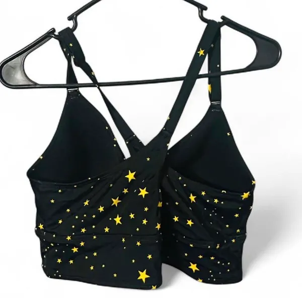 Torrid Black and yellow star print bikini top with adjustable straps and removable padding. Straps can be removed if you prefer to not have a racer back. Size 12 D/DD. Excellent condition. All offers accepted. Shipping next day. - Image 2