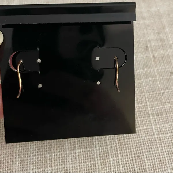 Dangling diamond and rose gold earrings - Image 2