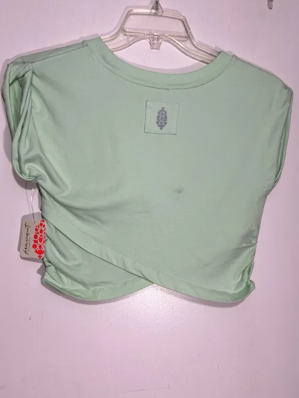 NWT FP Movement Pistachio green hot shot crossover top size L - Image 10