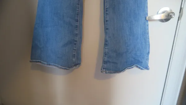 American Eagle Outfitters next level stretch super hi-rise flare jeans in medium wash blue size 4. - Image 7