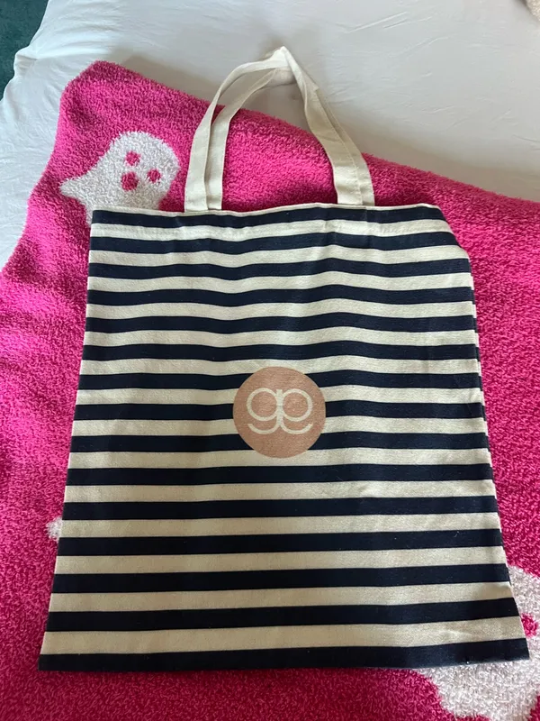Stylish Gorjana tote bag featuring navy and cream stripes. Perfect for everyday use. - Image 2