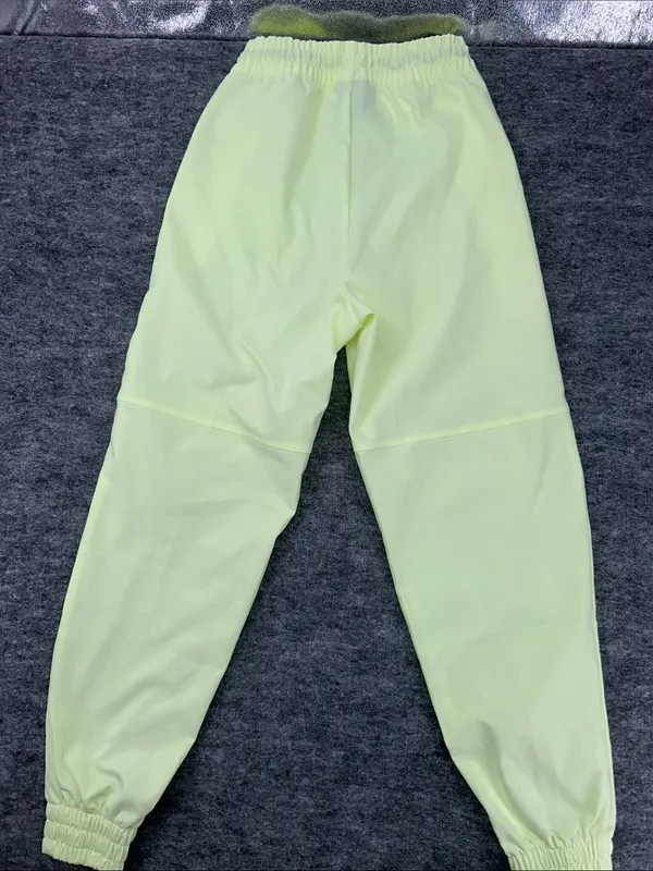 Nike Women's Sportswear Woven Pants in a bright neon green/yellow XS - Image 8