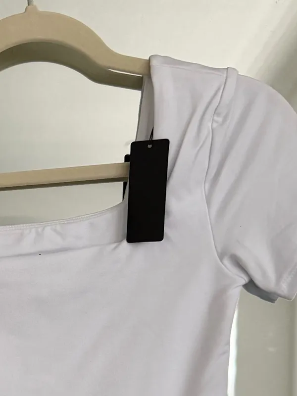 NWT. White Square Neck Short Sleeve Bodysuit in S - Image 2