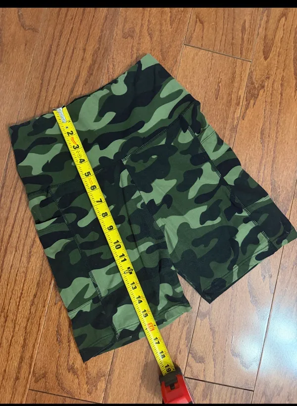 Green camo Active hustle shorts with side pockets for storage - Size Medium. ***Refer to measurement as size tag removed. Gently warn and Excellent condition. Measurements approximately 12” waste not fully stretched out x 14” long. Non-smoking home. Sold as is. Priced to sell at as is condition. If you don’t like my price make reasonable offers. - Image 4
