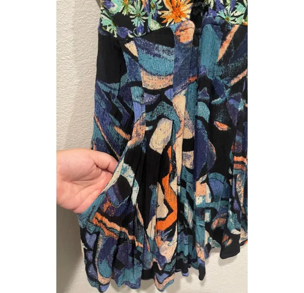 Free People Abstract Print Front Cut Out Smocked Flowy Romper - Image 6