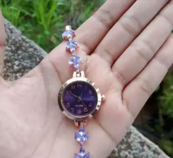Brand New Purple and gold watch with purple gemstones - Image 2