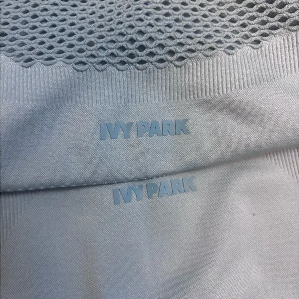 IVY PARK Light Blue Mesh Detail Athletic Athleisure Crop Top - Image 5