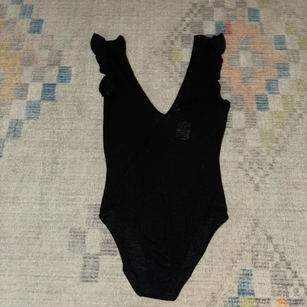 Out from under v neck bodysuit - Image 4