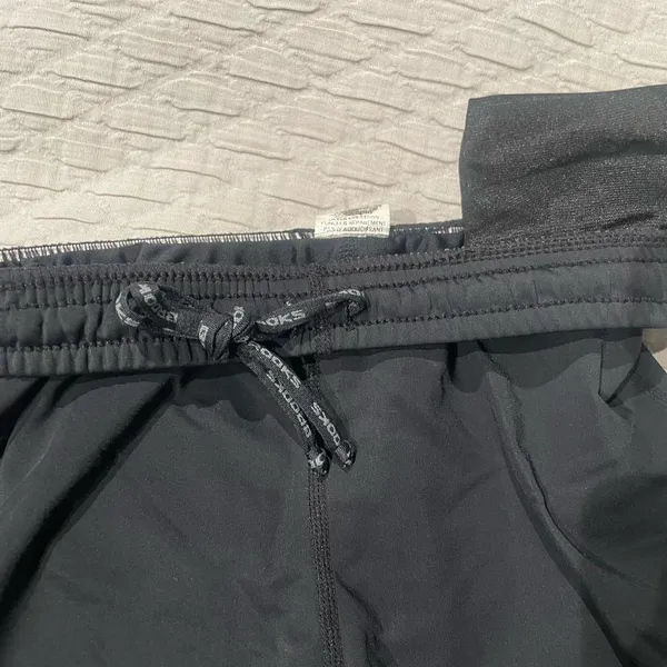 Brooks Women’s Fitted Black Athletic Running Shorts with drawstring and Logo - Image 3