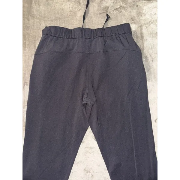 Lululemon Women's On The Fly Pants Black Mid Rise Travel Casual Size 8 - Image 6
