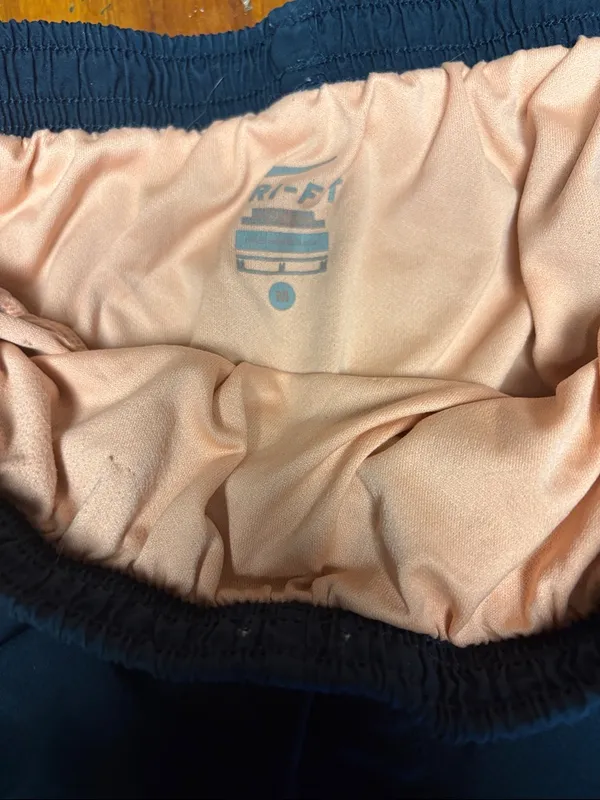 Nike Navy Running Shorts with Peach and Light Teal Trim - Image 2