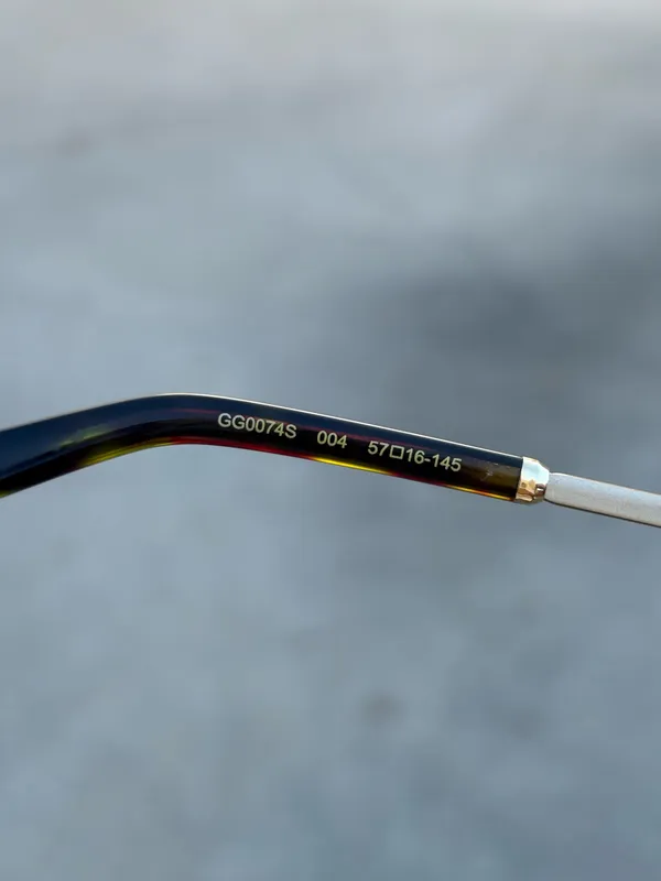 Gucci GG0074S Cat eye sunglasses gold metal frame purple gradient lenses - Image 16