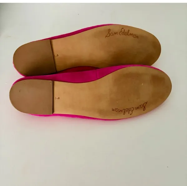 Vibrant pink suede, leather ballet flats by Sam Edelman. Featuring a rounded toe with silver logo charm detail. Perfect for adding flair to any outfit. - Image 6