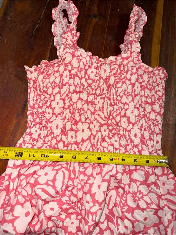 pink and white floral smocked sundress from the boutique brand Versona - Image 6