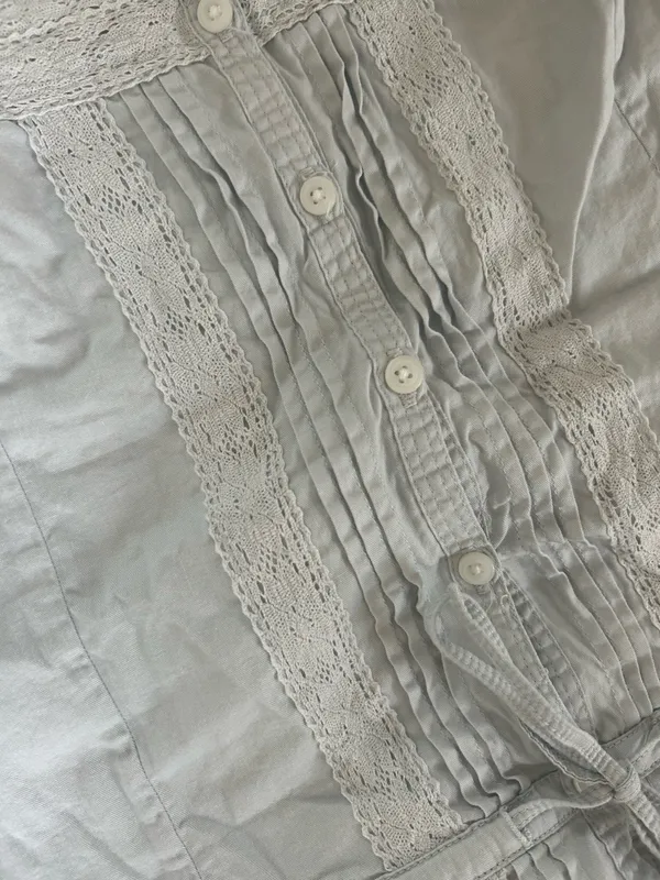 Baby blue Brandy Melville Maeve lace cami top with button-up front and ruffled hem - Image 2