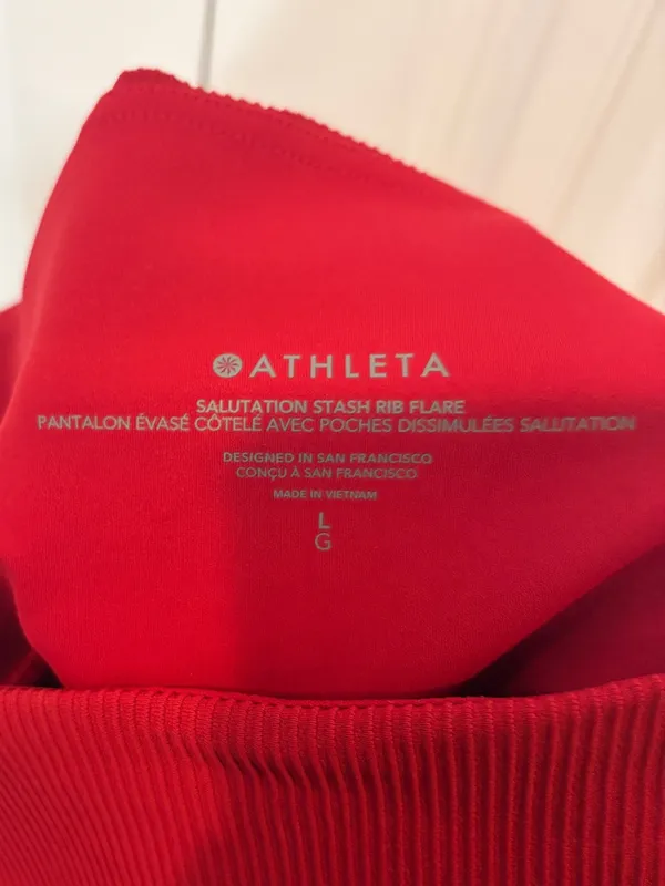 Athleta red salutation stash rib flare pants size large - Image 6