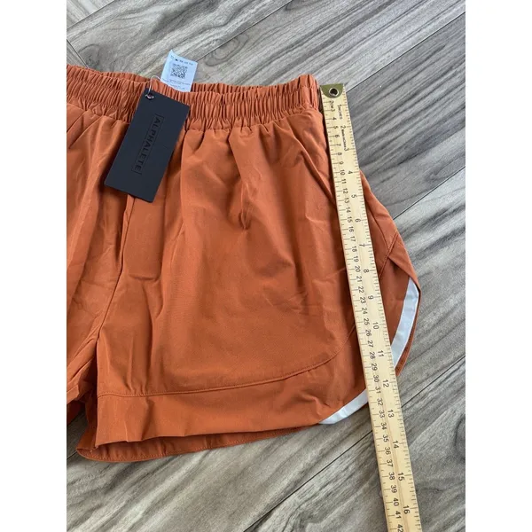 Alphalete Woman’s Infinity Stride Short W/ Liner - Sour Tangerine, Size Medium - Image 4