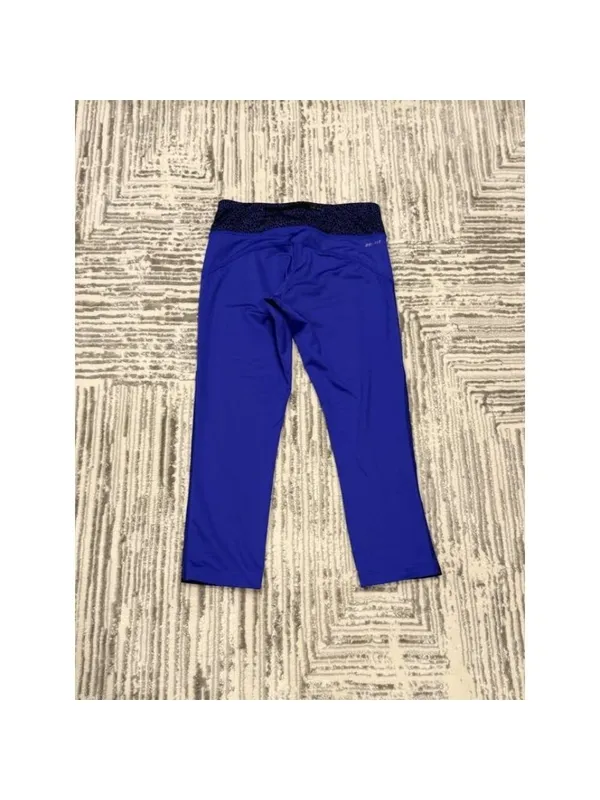 Nike women's small purple/black Dri-Fit capri leggings - Image 7